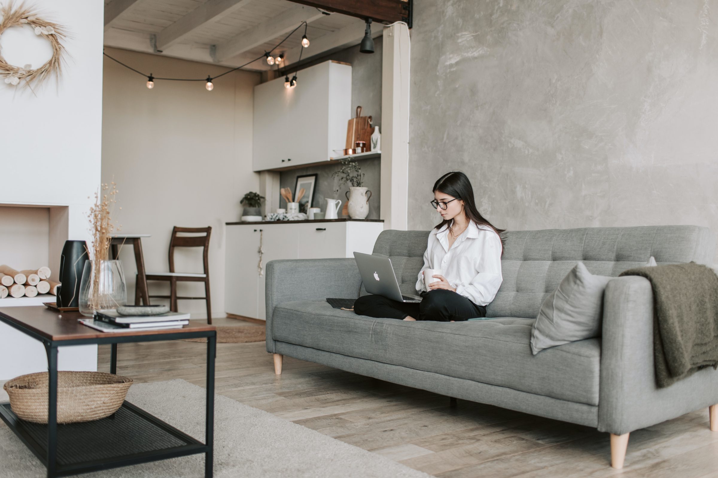 woman-sitting-on-a-sofa-while-working-with-laptop-4050293 woman-sitting-on-a-sofa-while-working-with-laptop-4050293